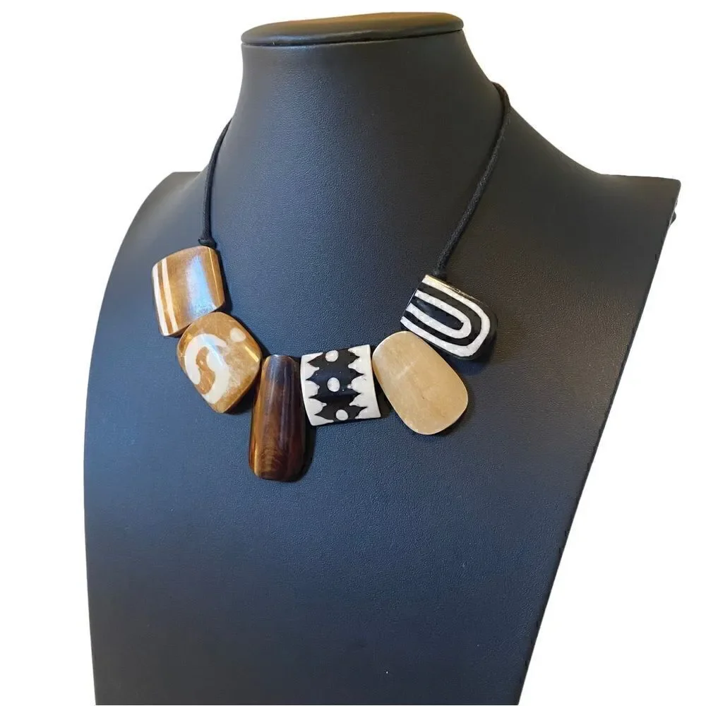 Six Piece Stone Tribal Looking Necklace on Black Adjustable Slide Cord.